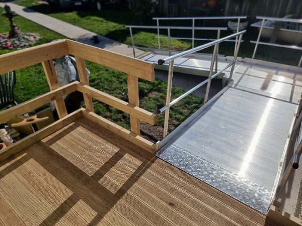 Sturdy aluminium wheelchair ramp providing accessible mobility. Ideal for residential and commercial use. Smooth surface and durable construction ensure seamless transitions.